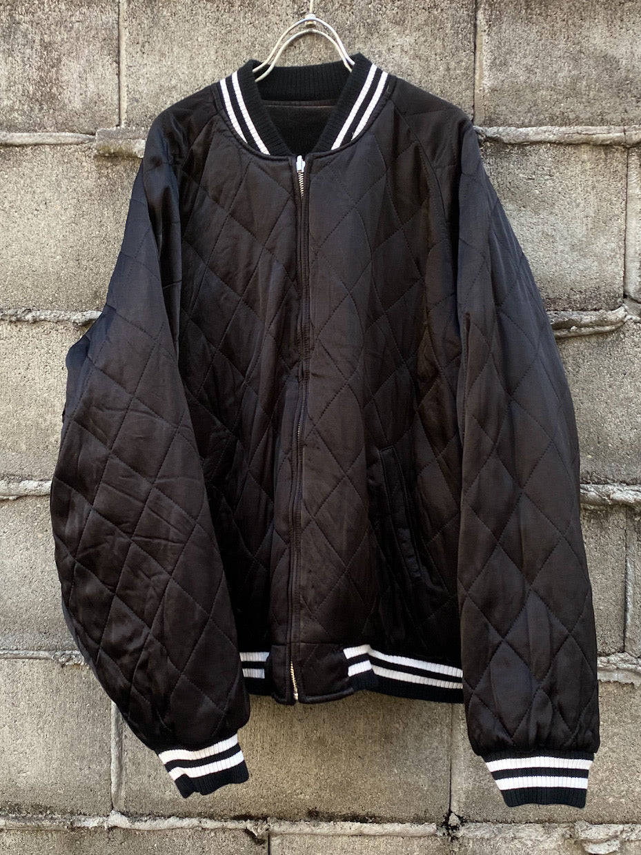 aging reversible souvenir jacket