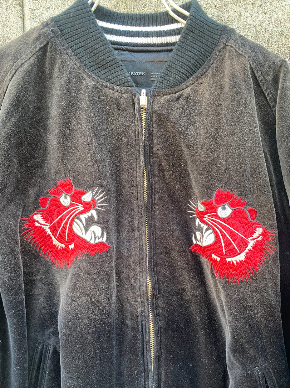 aging reversible souvenir jacket