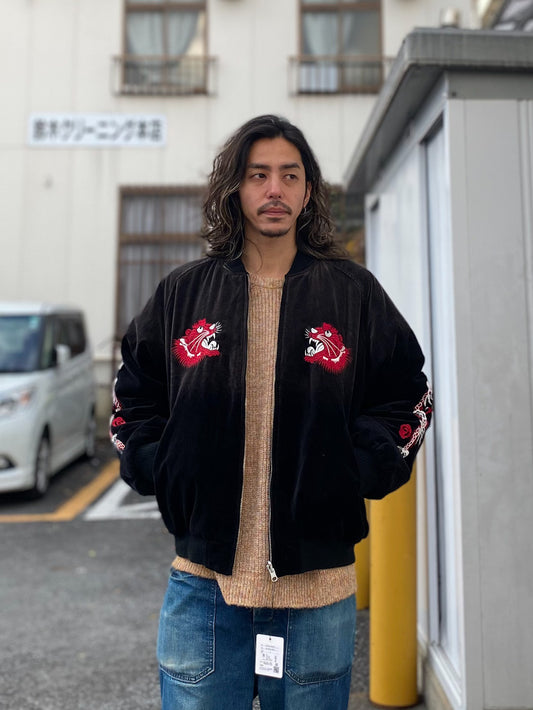 aging reversible souvenir jacket