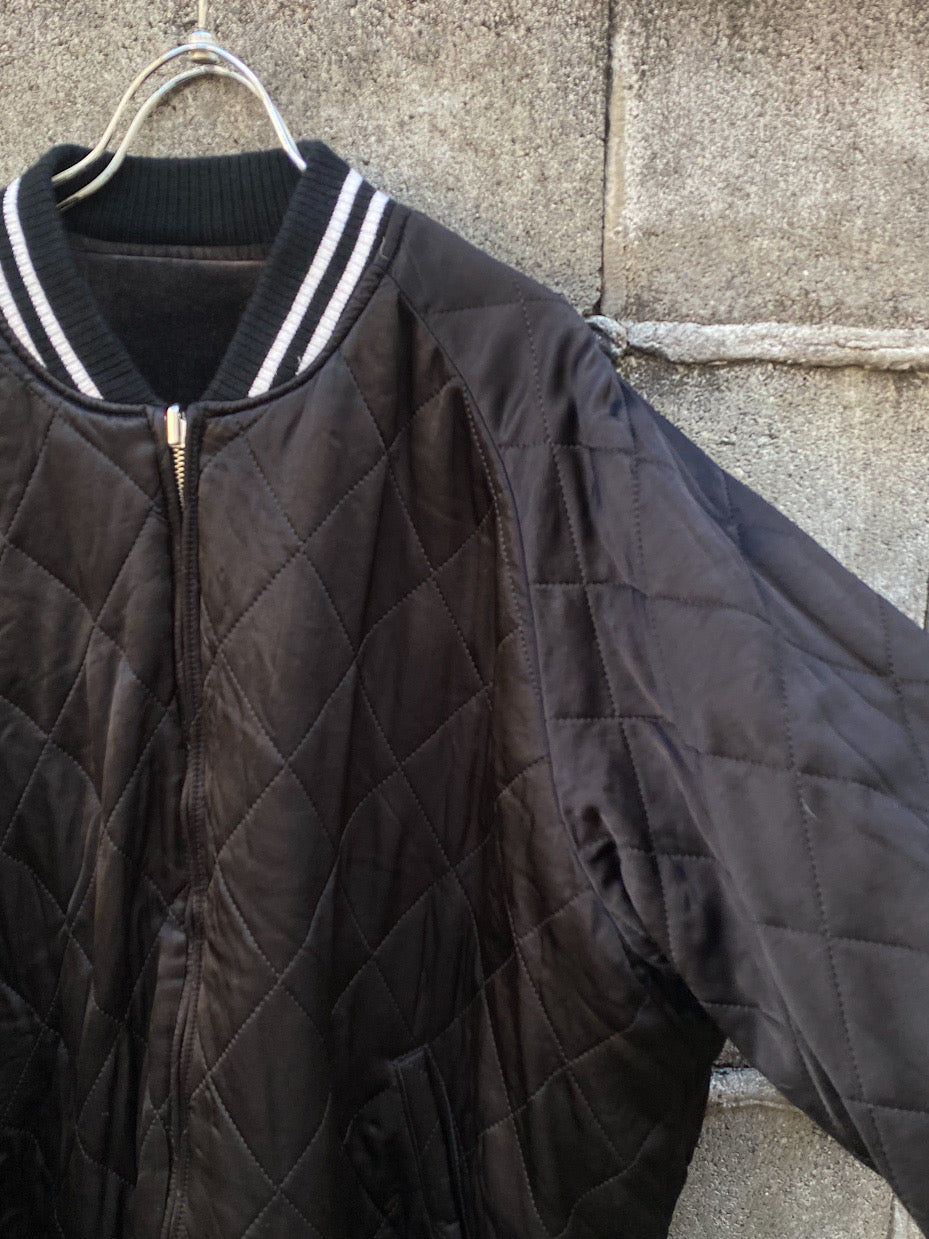 aging reversible souvenir jacket