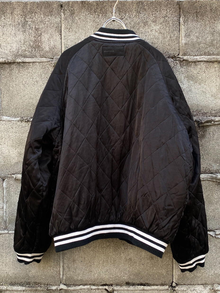 aging reversible souvenir jacket