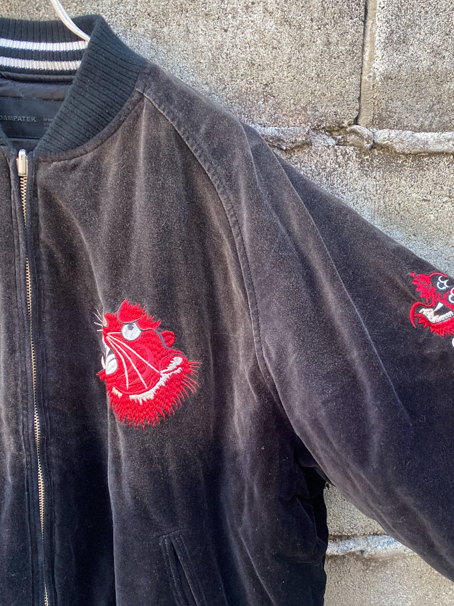 aging reversible souvenir jacket