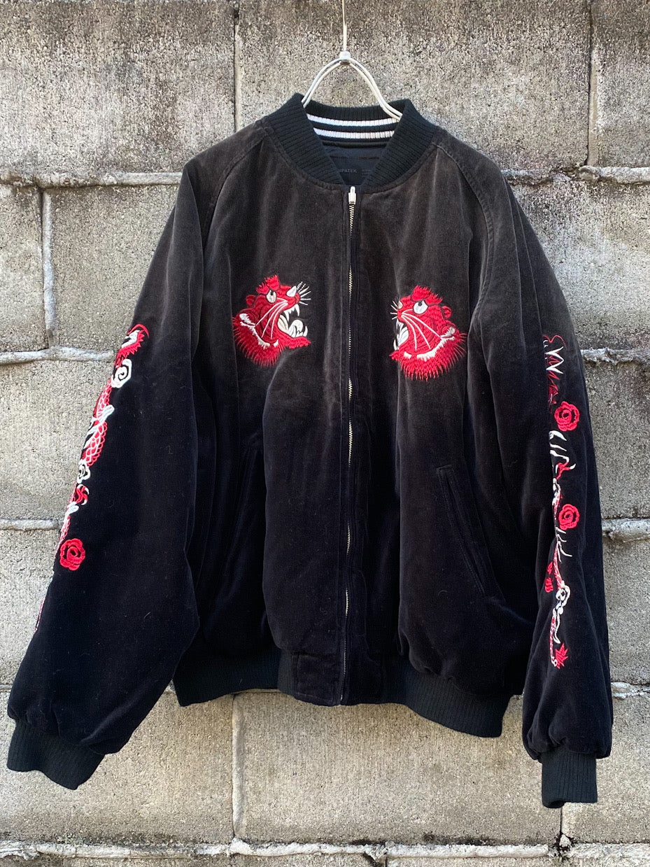 aging reversible souvenir jacket