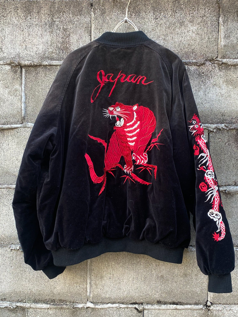 aging reversible souvenir jacket